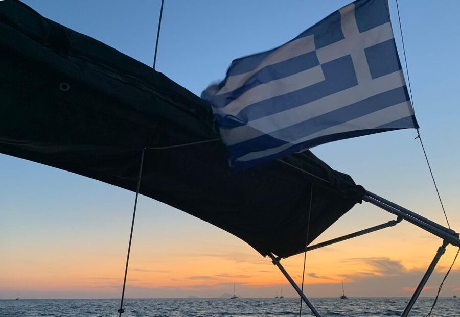 Santorini: Private 5-Hour Sunset Sailing Tour with Dinner - Under the lighthouse and into the caldera