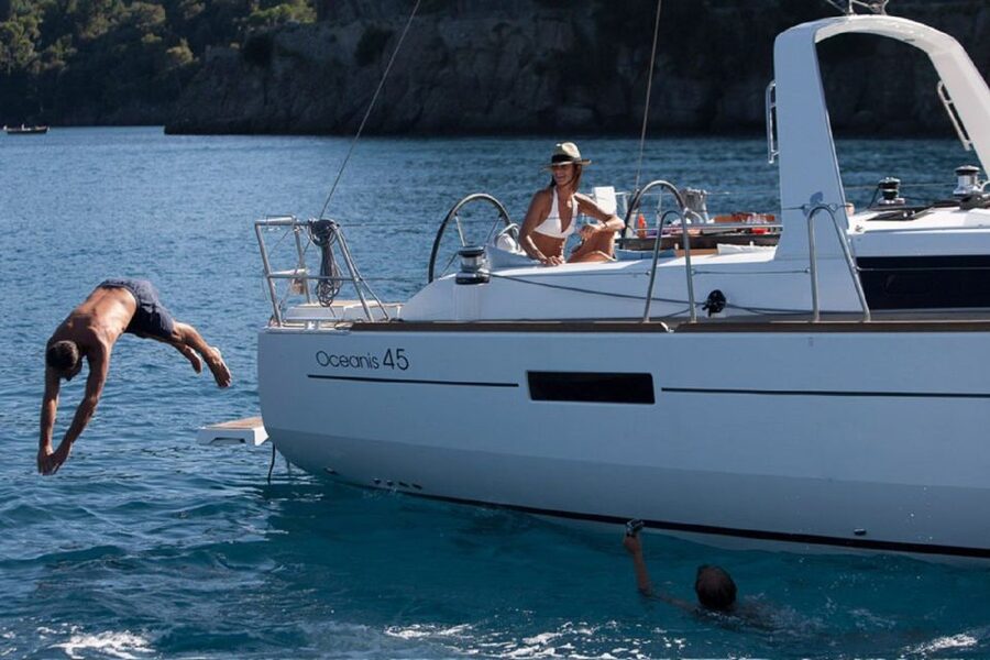 Santorini: Private Caldera Sailing Trip with Open Bar & Meal - Red Beach and the volcanic south coast