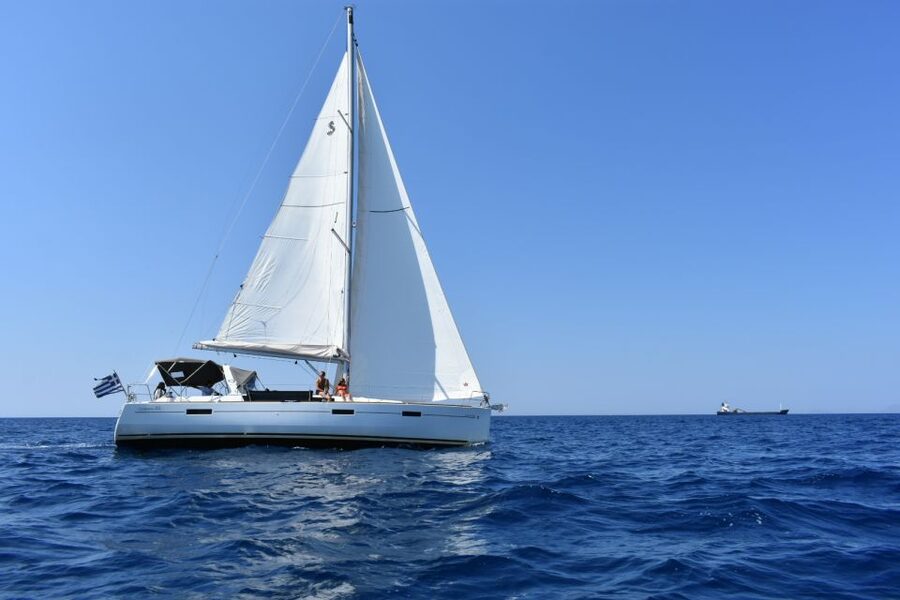 Santorini: Private Caldera Sailing Trip with Open Bar & Meal - Black Mountain and quiet volcanic bays
