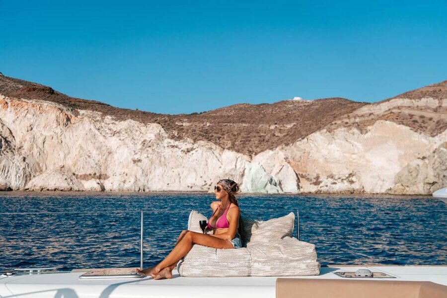 Santorini: Sunset Sailing Cruise, with Dinner and Drinks - Red Beach: a dramatic first swim stop