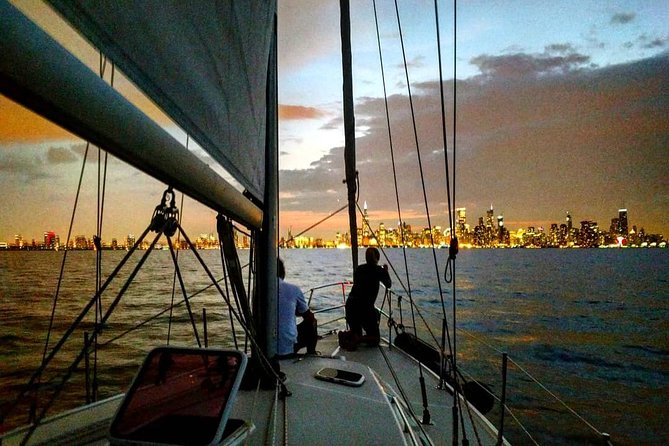 Serene Private Sunset Sail on Lake Michigan - Navy Pier, Chicago - Leaving Navy Pier as Chicago lights up