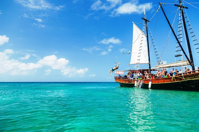 Set Sail in Aruba: Jolly Pirate Cruise with Snorkel Adventure - The rope swing is more than a photo prop