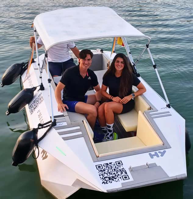 Seville: Sail the River. 100% private - The first views: Triana Bridge and the old port