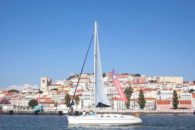 Small-Group Sailing Tour on the Tagus River from Lisbon - Lisbon’s bridge and the Cristo Rei statue