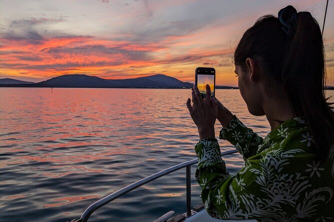 Sunset and Aperitif on a Sailing Boat in Alghero - Seeing Alghero’s walls from the water