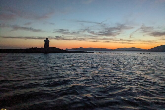 Sunset and Aperitif on a Sailing Boat in Alghero - Arrival and timing tips at Banchina Domenico Millelire