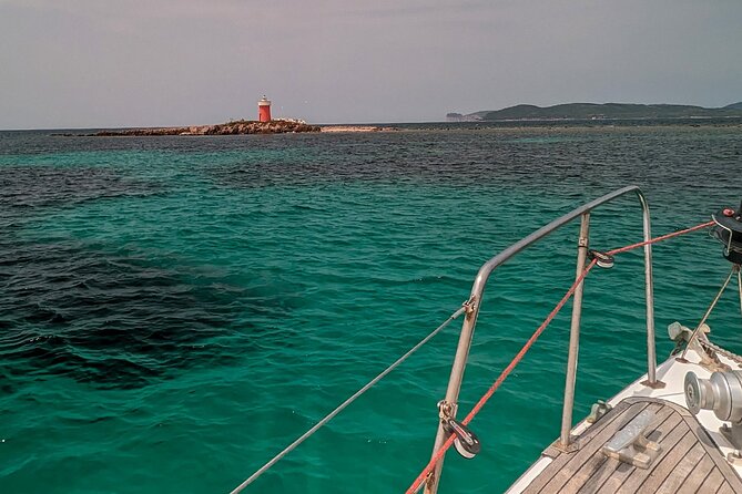 Sunset and Aperitif on a Sailing Boat in Alghero - Wine, snacks, and the boat’s party mood