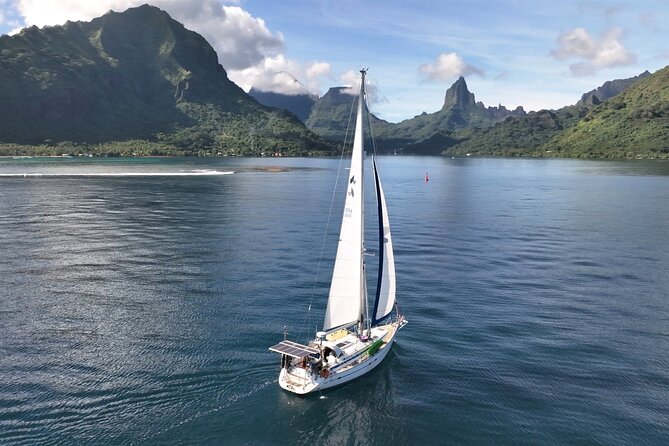 Sunset Cruise : Moorea Sailing on a Catamaran named Taboo - Ōpūnohu Bay and a second view of Moorea