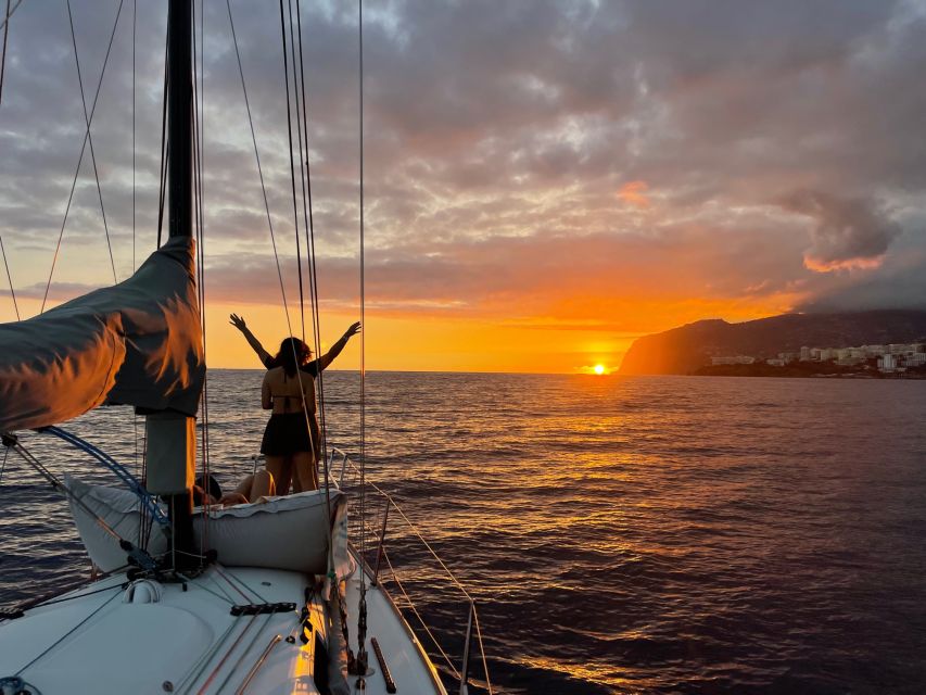 Sunset on a sailing boat - Swimming Below Cabo Girão