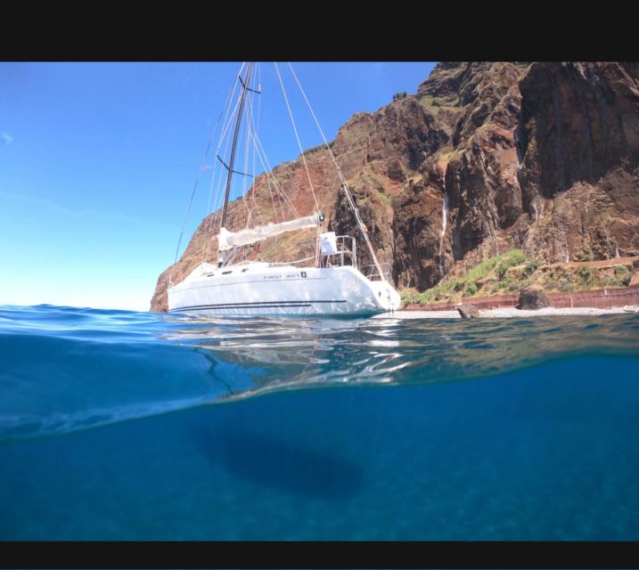 Sunset on a sailing boat - Sailing Along Madeira’s Cliffs at Sunset