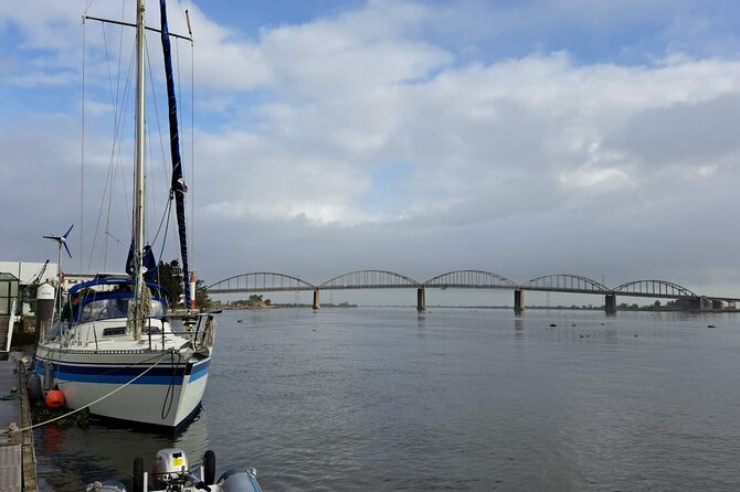 Sunset Sailboat Tejo River Tour 2h - Returning to Alcântara with wine and blankets