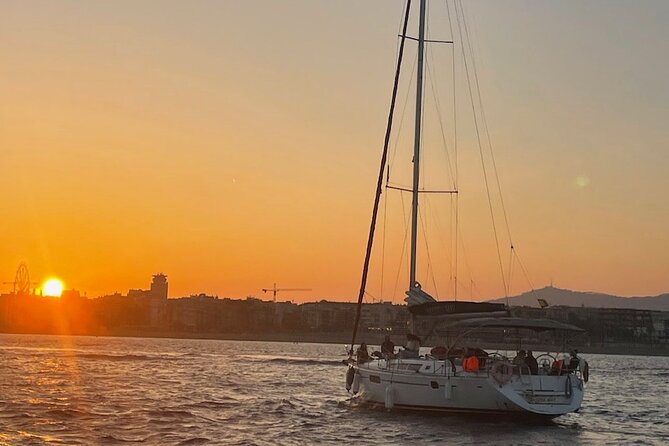 Sunset Sailboat Tour along the Coast with Open Bar - Leaving Port Olimpic as the light softens
