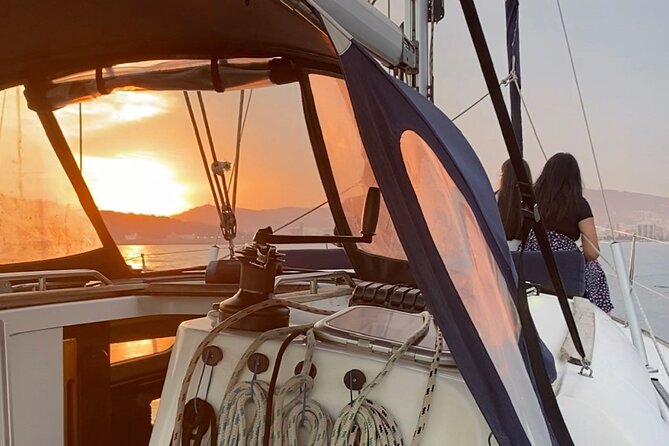 Sunset Sailboat Tour along the Coast with Open Bar - Cava, snacks, blankets, and comfort