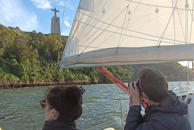 Sunset sailing boat trip in Lisbon with snacks - The 25 de Abril Bridge and Belém