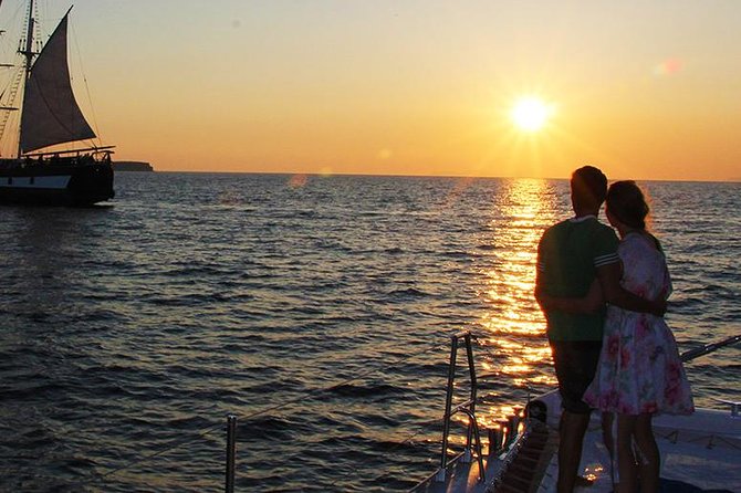 Sunset Sailing Catamaran Cruise in Santorini with BBQ and Drinks - Hot springs near the volcano