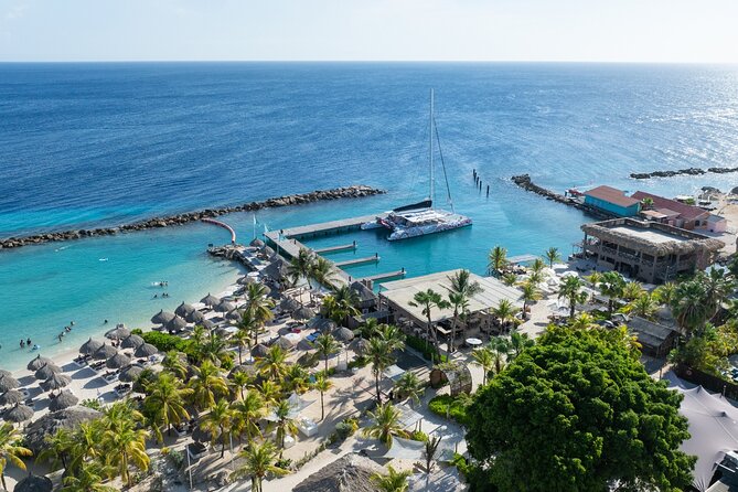Sunset Sailing Cruise with premium drinks and bites - Caracas Bay and Fuik Bay by Catamaran
