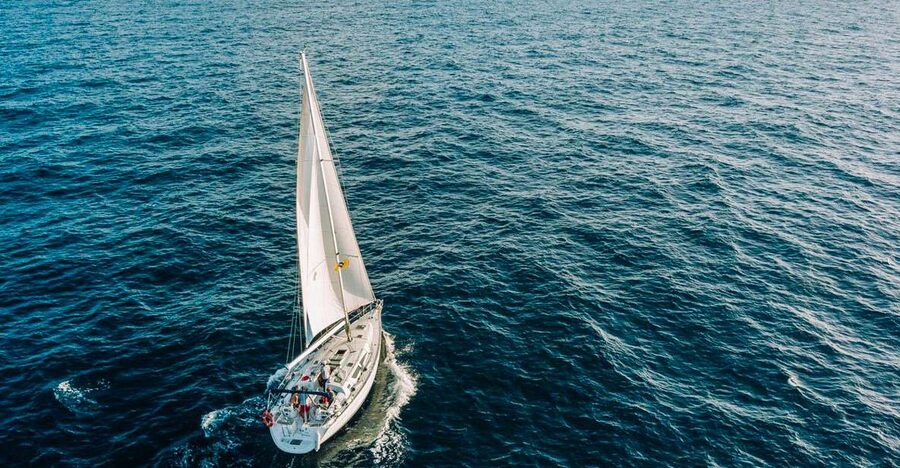 Tenerife: Sailboat Tour Whale Watching Food and Snorkeling - Sailing south from Puerto Colón