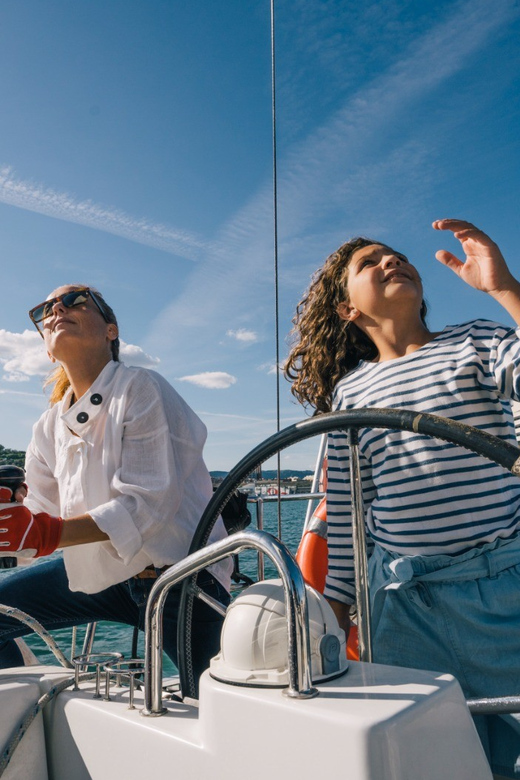 Two Hour Luxury Sailing Experience with Open Bar - Learning to raise sails and steer