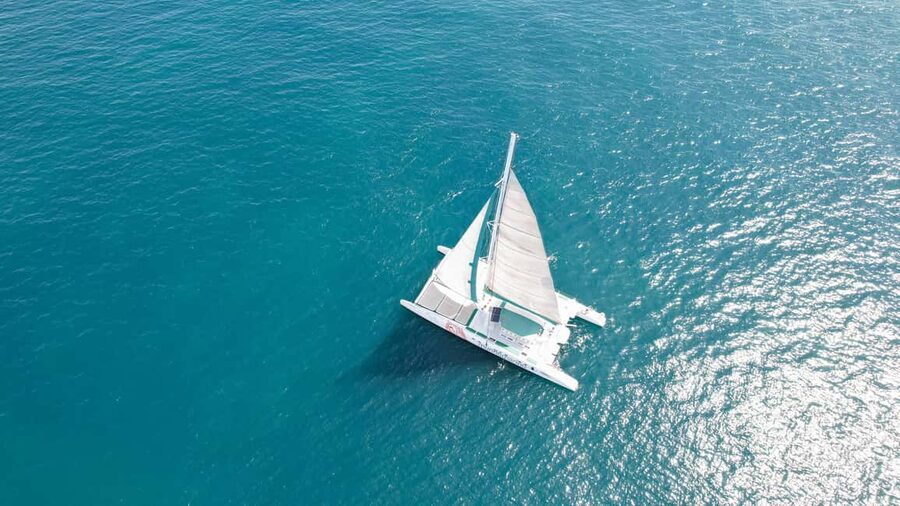 Valencia: Sailing Catamaran with Swimming & Optional DJ - The swimming stop near Valencia’s shore